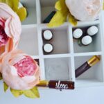 Oil Gas Shifts - several vials in white wooden organizer shelf