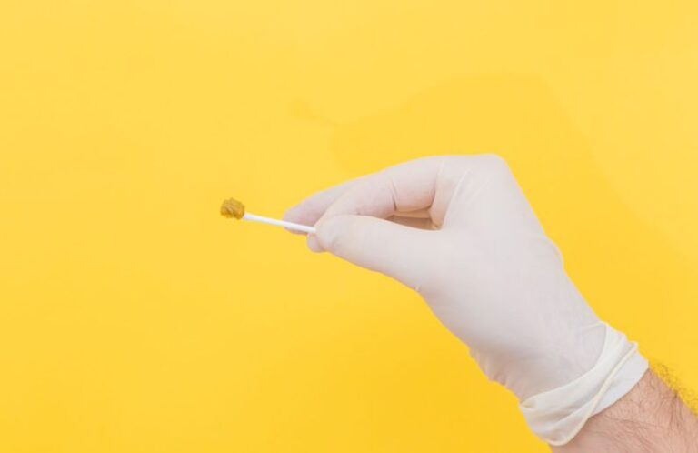 Tube Packaging - person holding white cotton buds