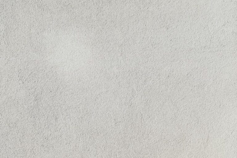Material Composites - a close up of a white stucco wall