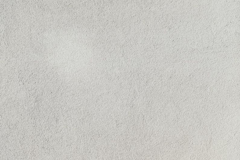 Material Composites - a close up of a white stucco wall