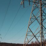 Telecommunications - brown electric post under blue sky during daytime