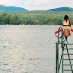 Weld Quality - women sitting on chair watching body of water