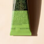 Tube Packaging - a tube of toothpaste sitting on top of a table