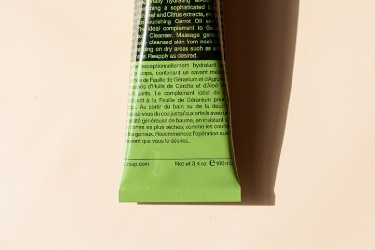 Tube Packaging - a tube of toothpaste sitting on top of a table