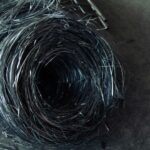 Tube Coiling - a bunch of wire sitting on top of a floor