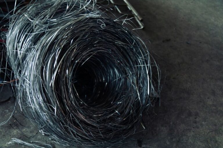 Tube Coiling - a bunch of wire sitting on top of a floor