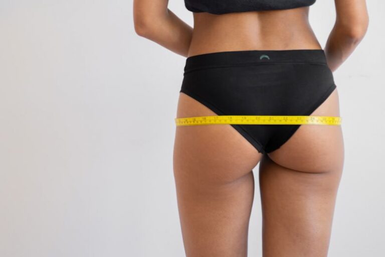 Measuring Techniques - woman in black sports bra and black panty