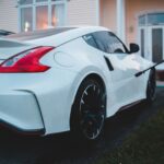 Next-gen Alloys - white porsche 911 parked near white house