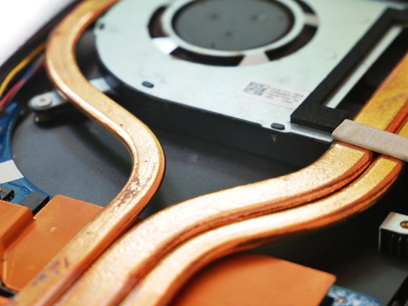 Cooling Technologies - a close up of a hard drive being removed from a computer